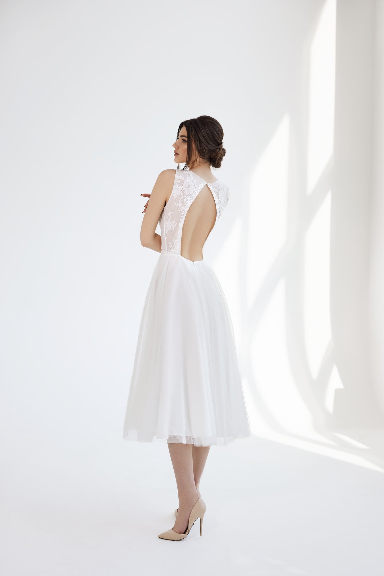 Espalda del vestido de novia a medida Christina – diseño elegante y sofisticado para novias actuales